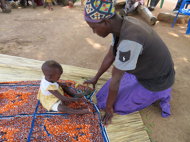 Mother plays with child